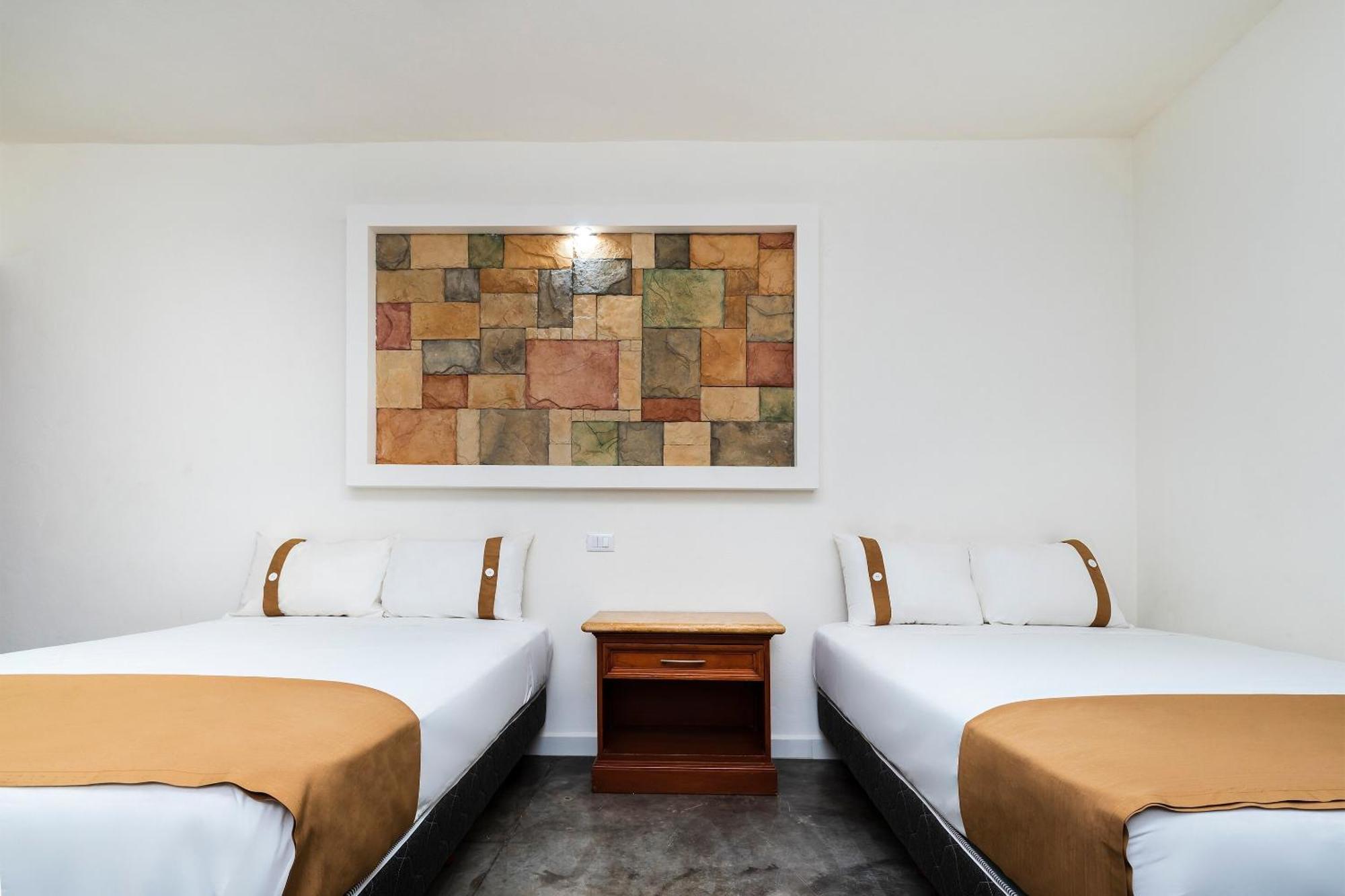 Capital O Hotel Joyma Suites, San Luis سان لويس بوتوسي المظهر الخارجي الصورة