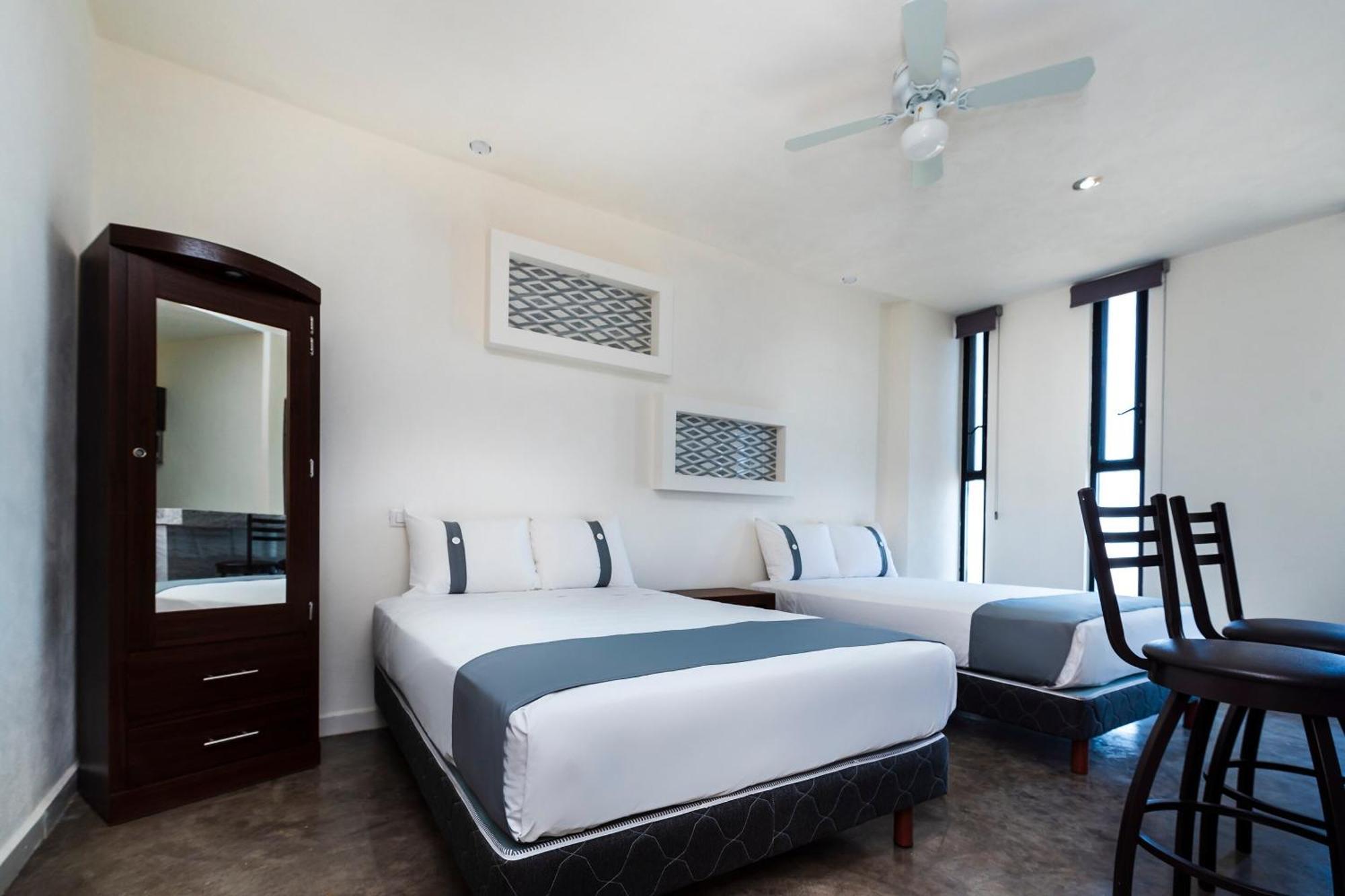 Capital O Hotel Joyma Suites, San Luis سان لويس بوتوسي المظهر الخارجي الصورة
