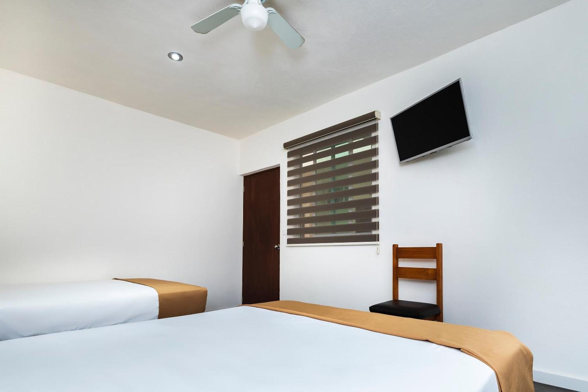 Capital O Hotel Joyma Suites, San Luis سان لويس بوتوسي المظهر الخارجي الصورة